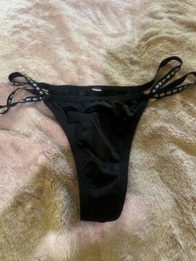 Juicy Couture Black Double-Strap thong panty.